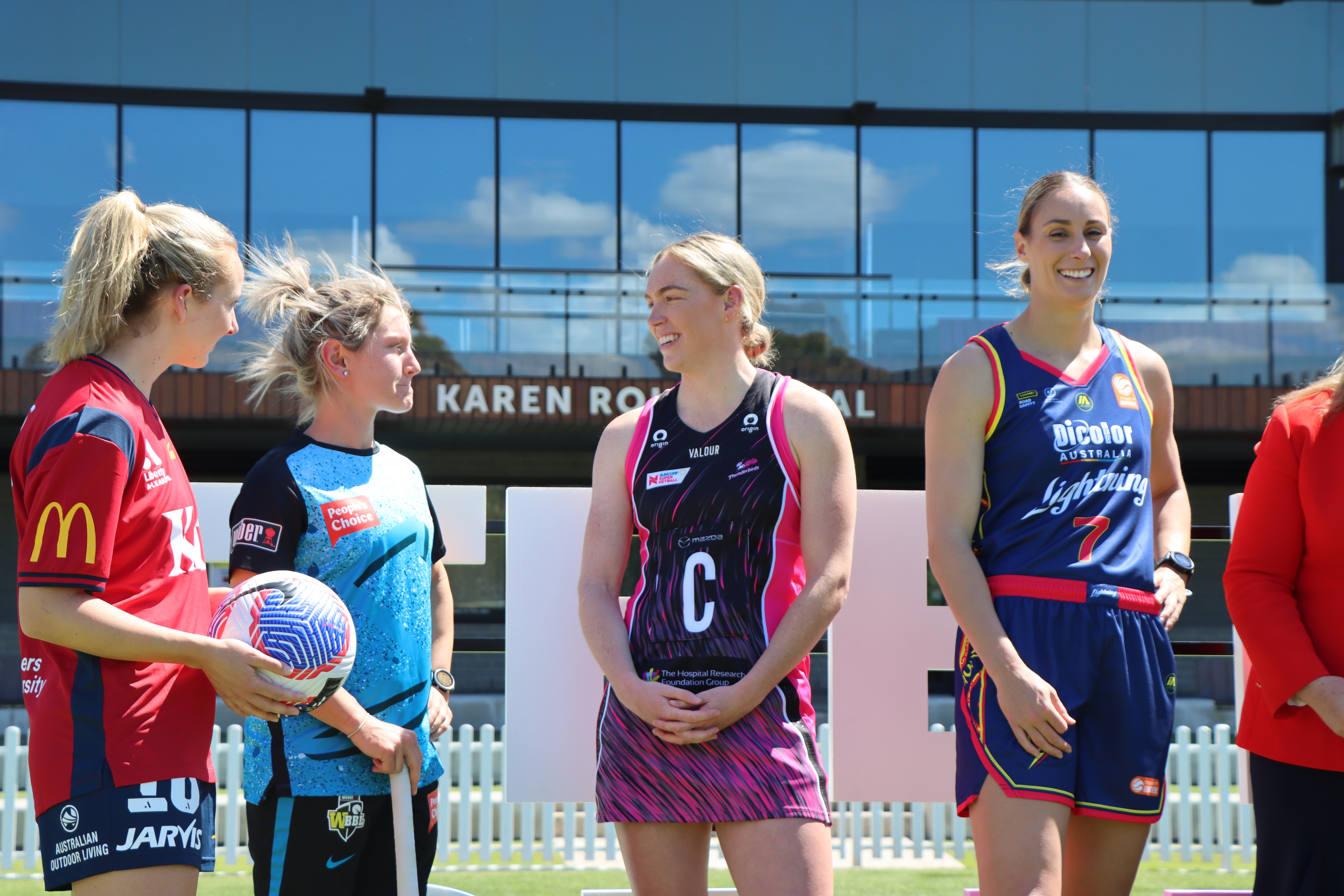 Hannah Petty in conversation with other players from the five other clubs 